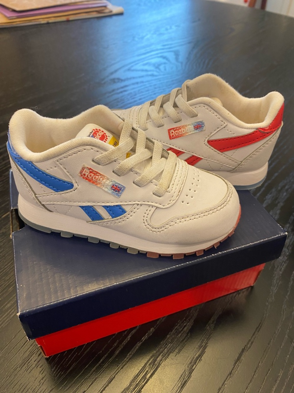 Reebok Kids White Sneakers with Blue and Red Accents Popsicle edition